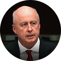 Older white business man in a suit and tie