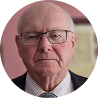 Older white business man with glasses