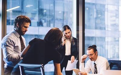 Photo of business people talking during a meeting