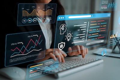 Business woman evaluating AI technology on a desktop
