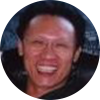 Photo of a older asian men with a black button up