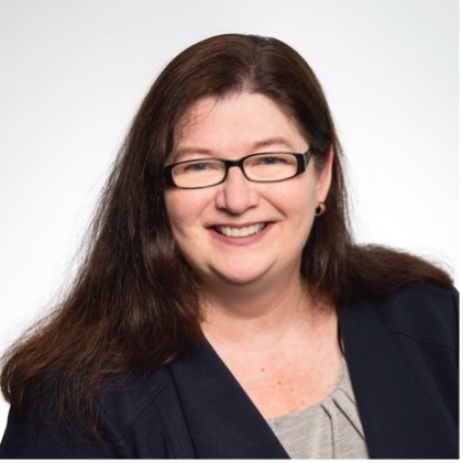 Image of Dr. Cheryl Netterfield, she has brown hair and wears glasses.